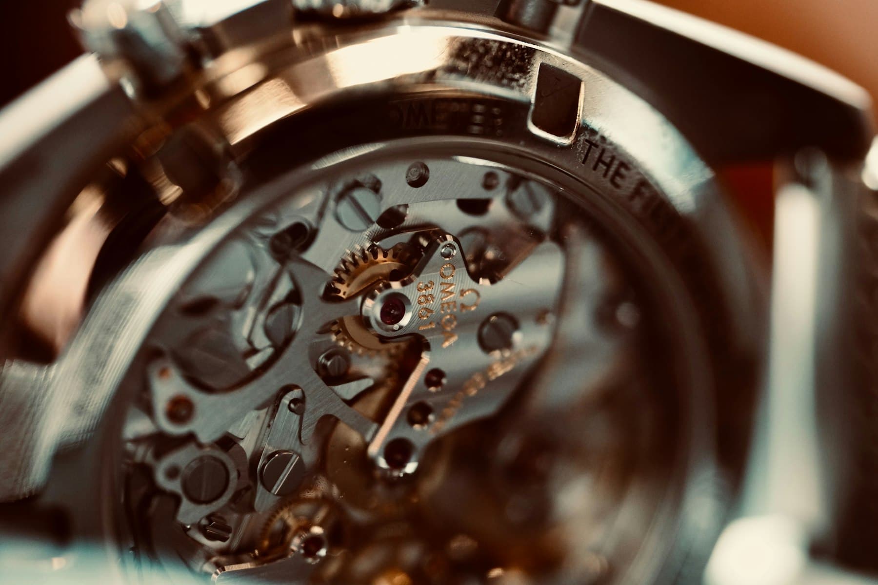 Macro photograph of an intricate mechanical watch movement